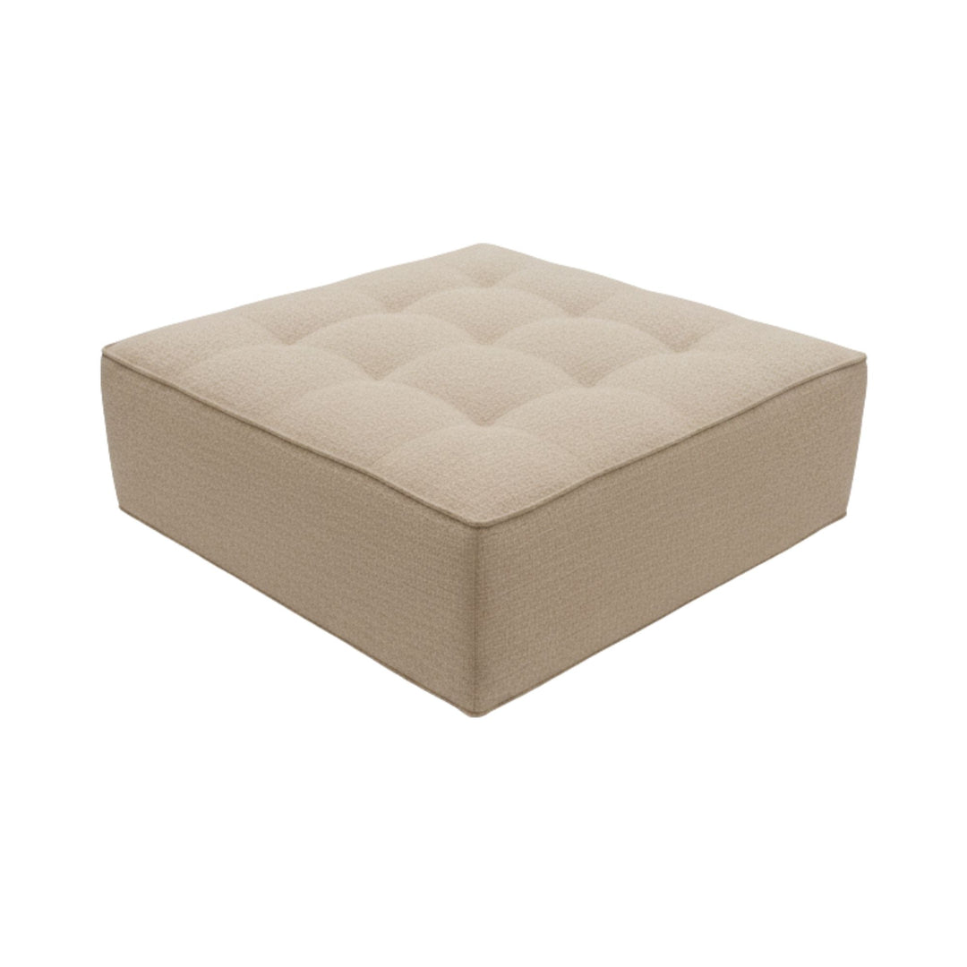 Angled view of a Hera square pouf showing seat and base detail.