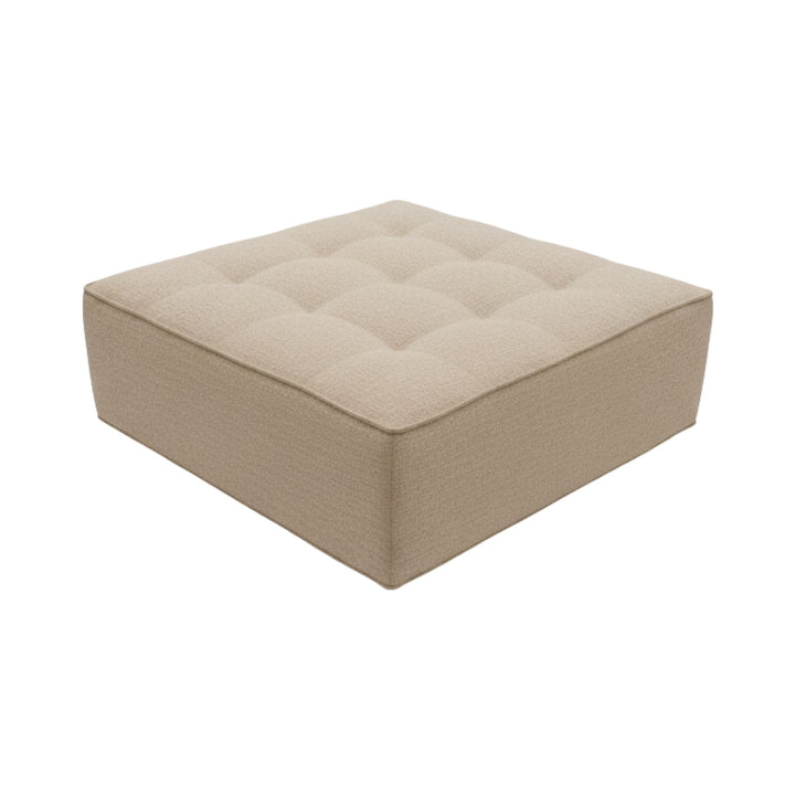 Angled view of a Hera square pouf showing seat and base detail.