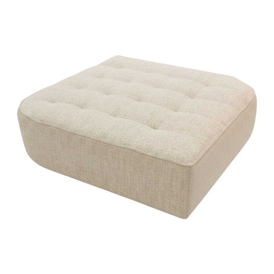 Angled view of a Hera rounded pouf showing seat and base detail.