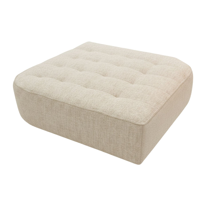 Angled view of a Hera rounded pouf showing seat and base detail.