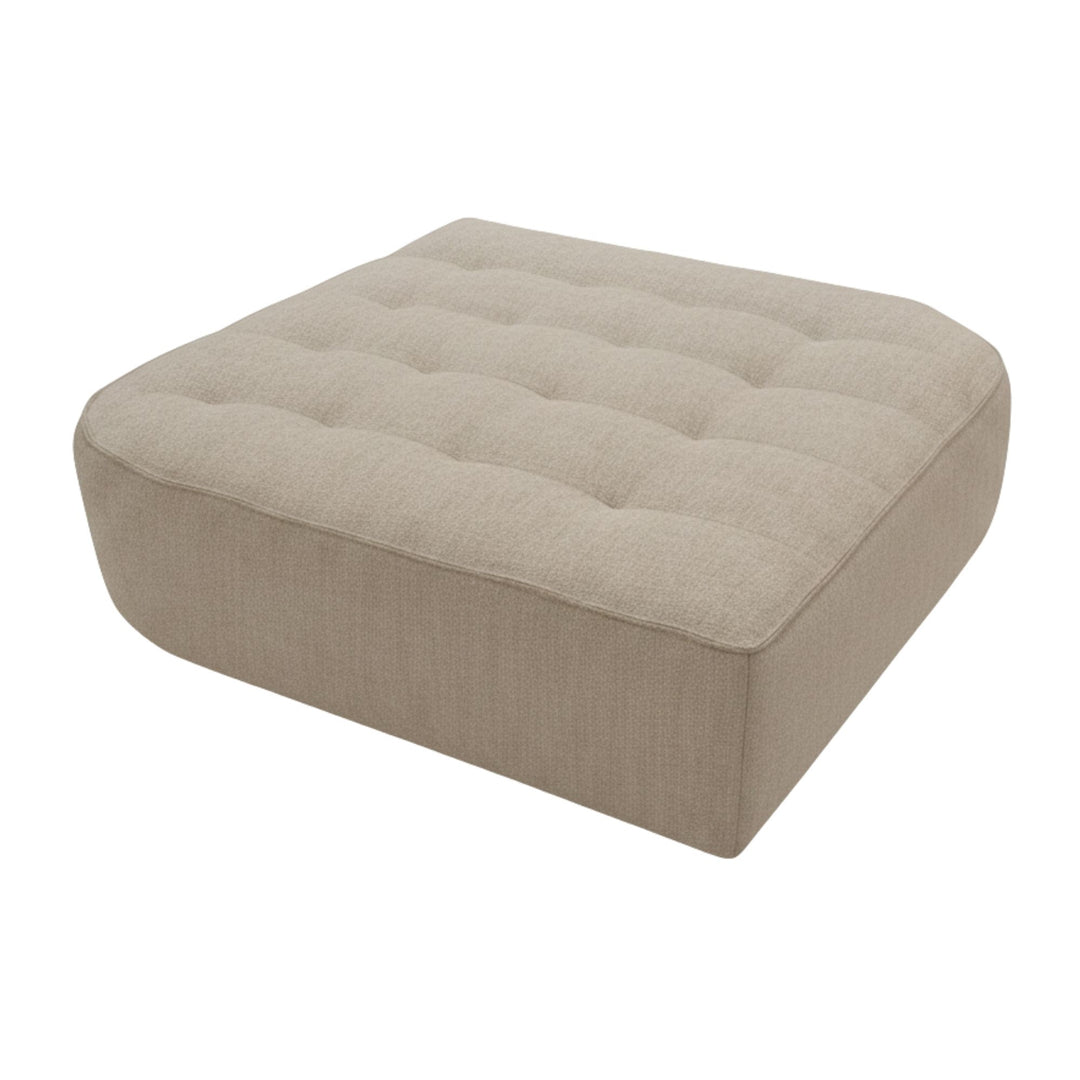 Angled view of a Hera rounded pouf showing seat and base detail.