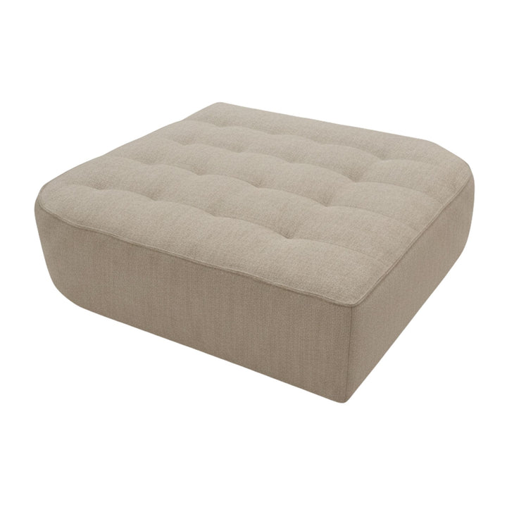 Angled view of a Hera rounded pouf showing seat and base detail.