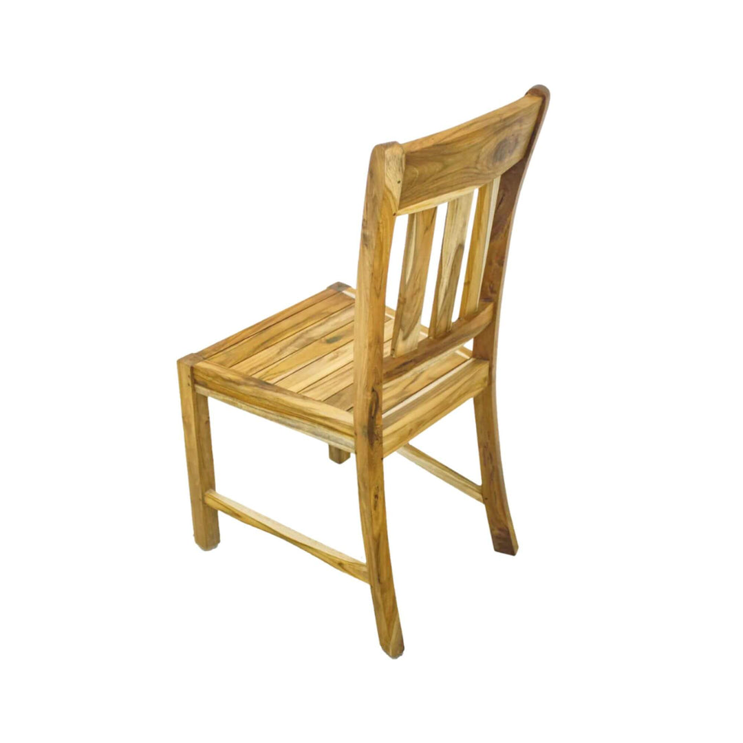 Angled view of solid teak dining chair showing curved backrest