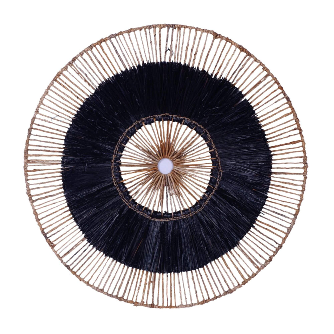 Hitam Wall Deco showing contrast between dark center and natural frame in organic texture.

