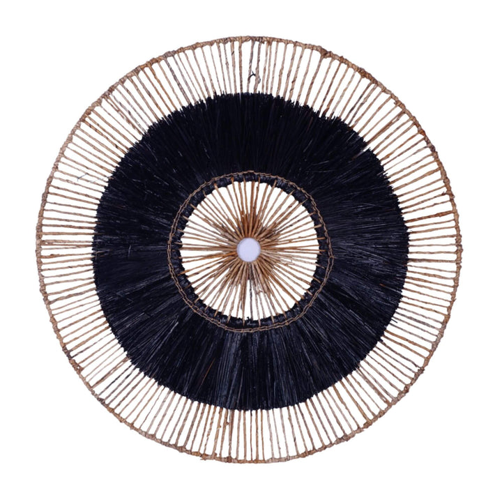 Hitam Wall Deco showing contrast between dark center and natural frame in organic texture.

