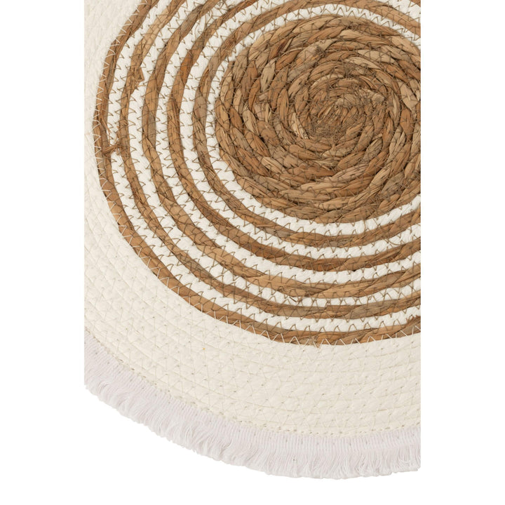 Close-up detail showing woven rattan texture and fringed border.

