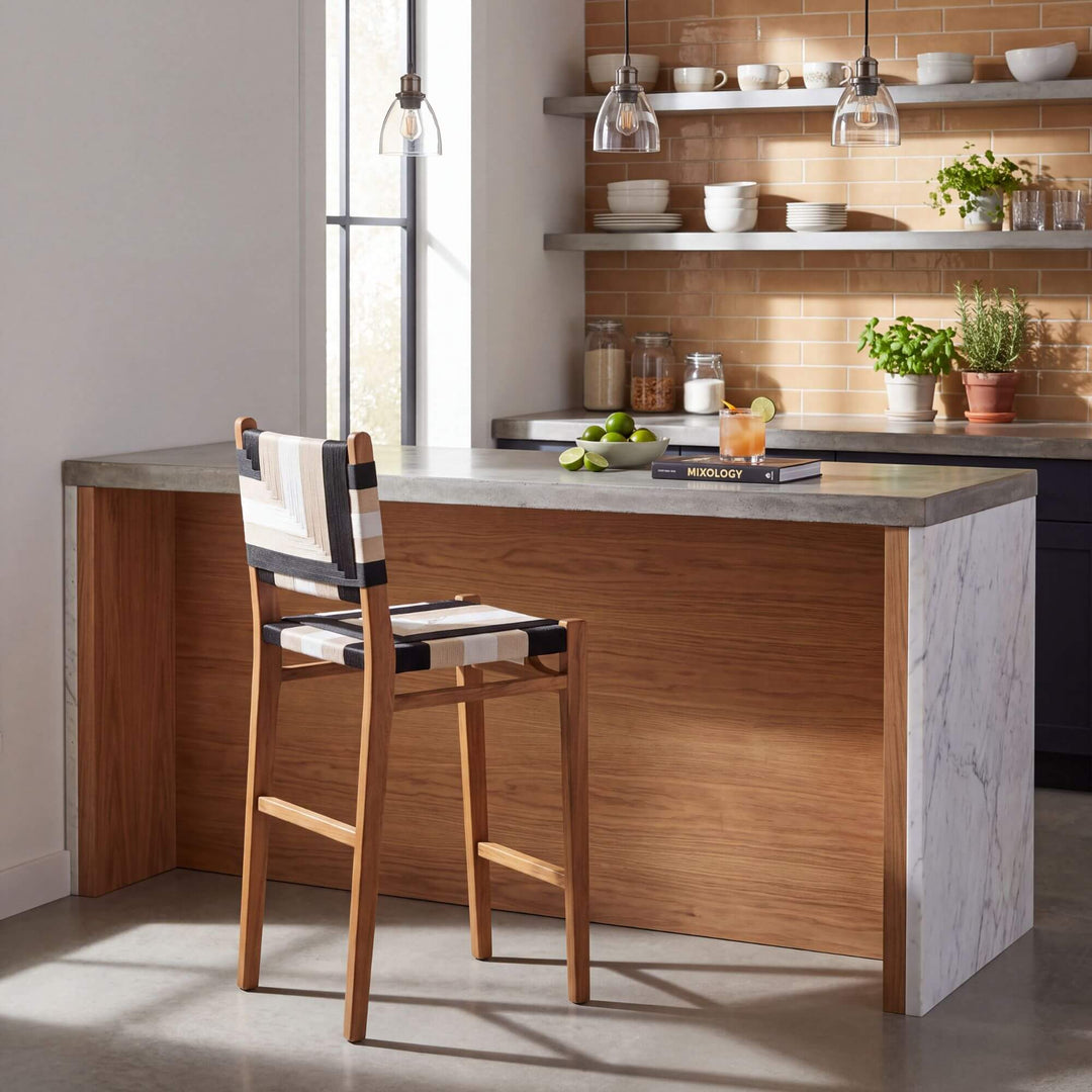 Huraa 75 cm kitchen stool styled at a wooden bar-height island in a warm contemporary interior