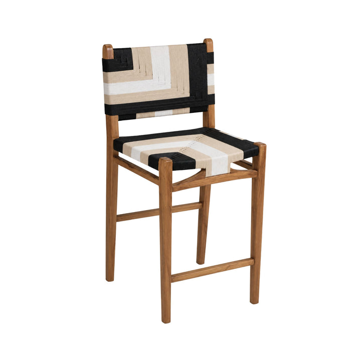Front angled view of the Huraa kitchen stool with teak wood frame and geometric black and ivory rope weaving