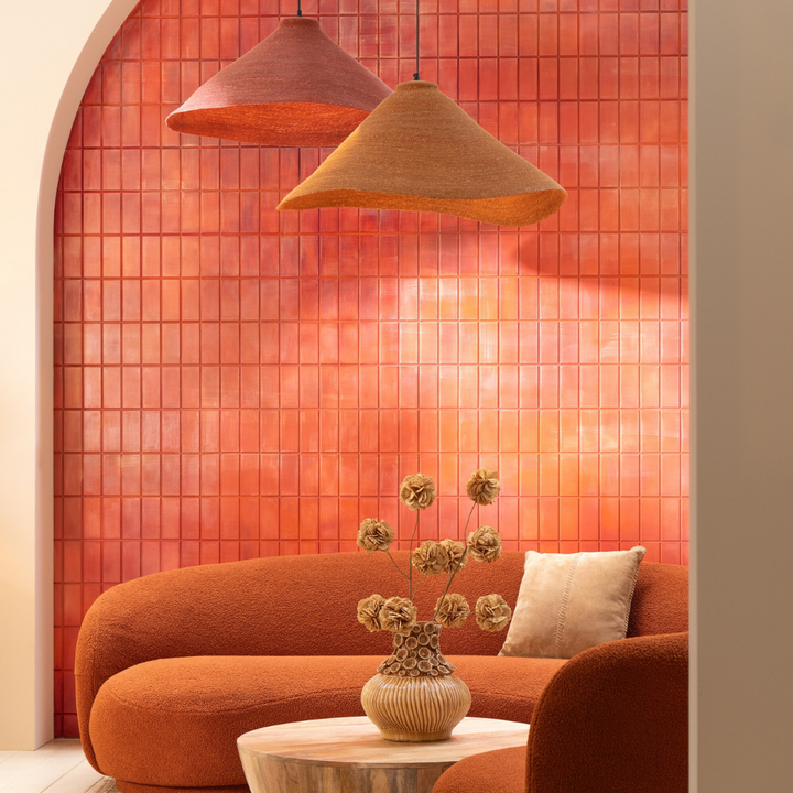 Rust and Terracota Hurgada ceiling lamp above a modern interior with natural decoration.