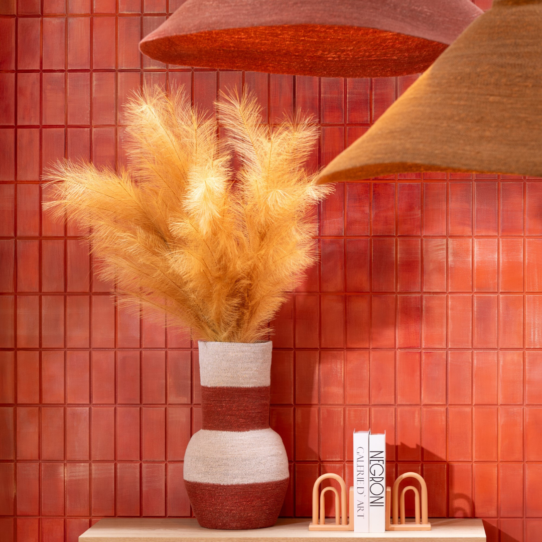 Close-up of Terracotta and rust Hurgada ceiling lamp styled in a warm-toned living room.