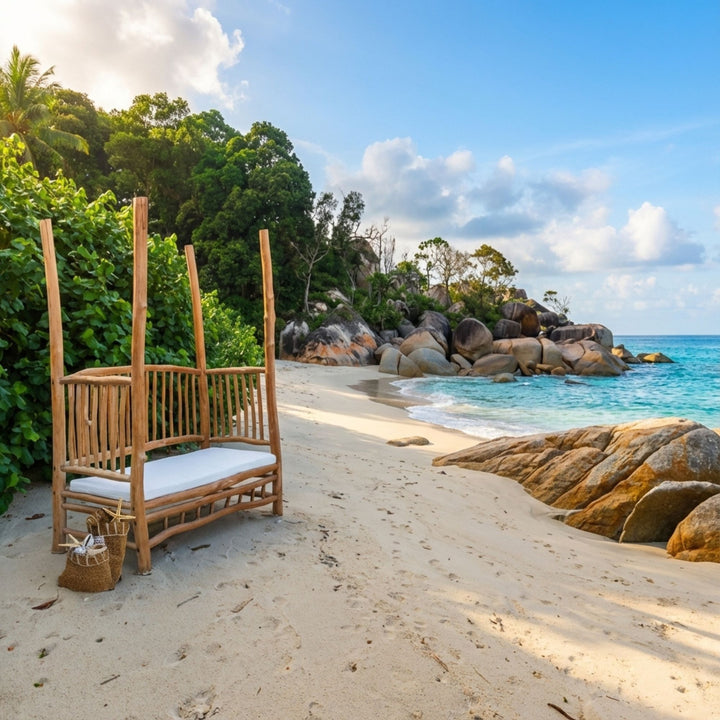 Styled outdoor view of the Hydra daybed placed on a beach setting highlighting its coastal inspiration.
