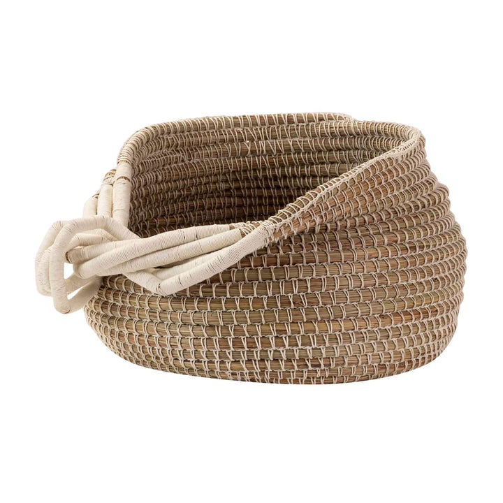 Ibeyi Basket handwoven from seaweed and cotton in natural and white tones.