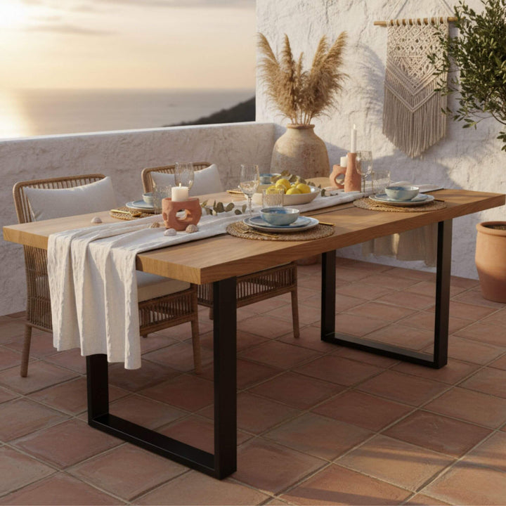 Outdoor covered terrace dining setup with the Iroko wood table.