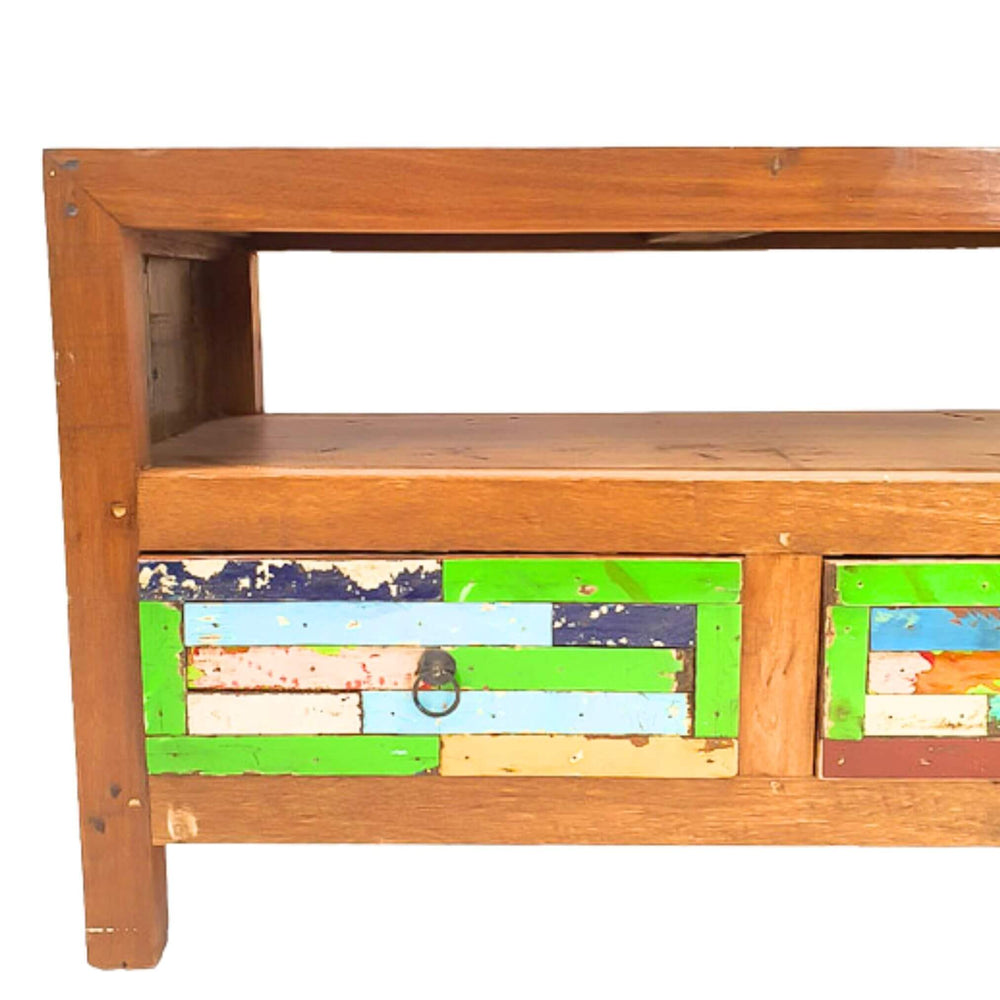 Close-up of reclaimed teak drawer fronts with original paint on the TV console