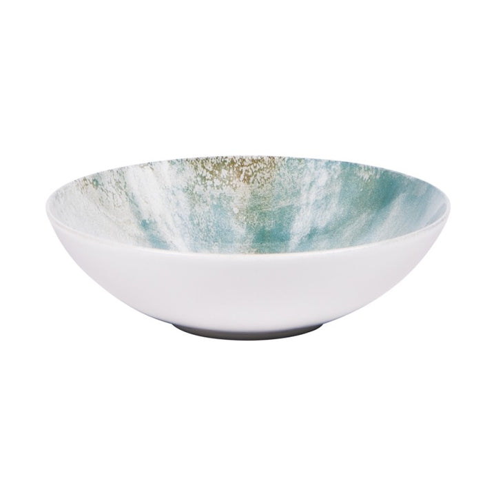 Top view of Islande ceramic saladier with white and green coastal-inspired glaze.
