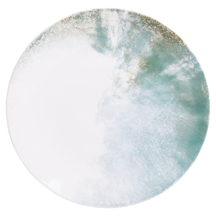 Top view of Islande ceramic serving plate with white and green coastal-inspired glaze.