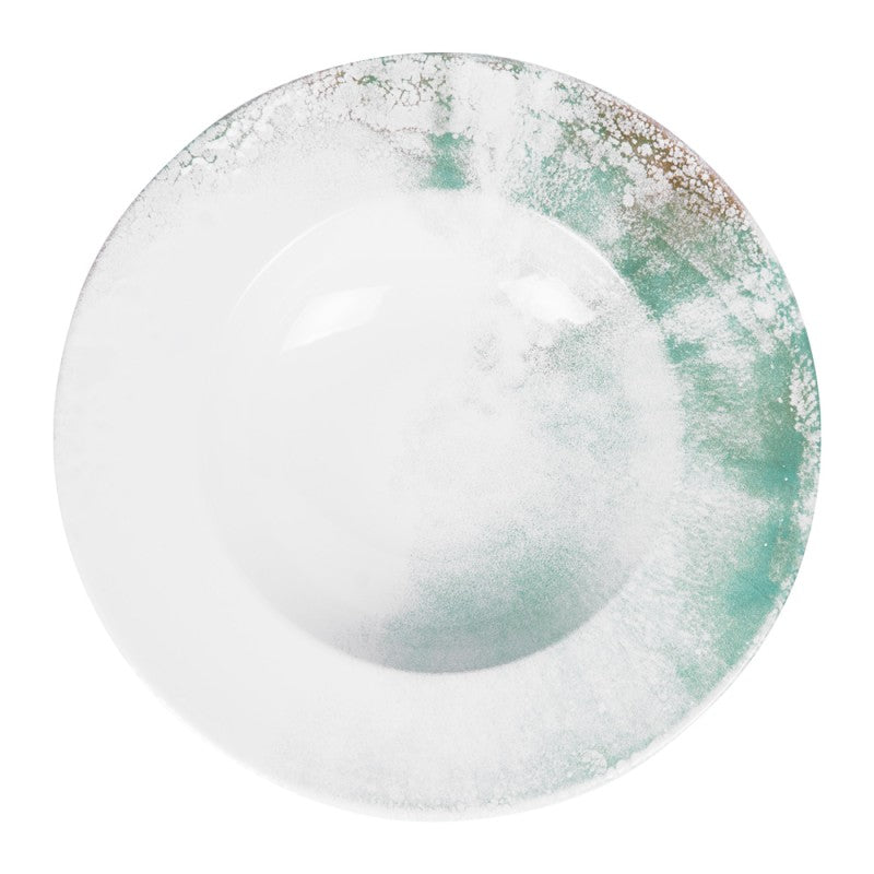 Top view of Islande ceramic pasta plate with white and green coastal-inspired glaze.