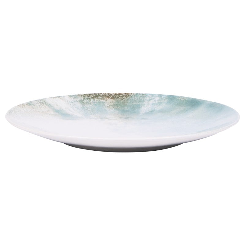 Top view of Islande ceramic serving plate with white and green coastal-inspired glaze.