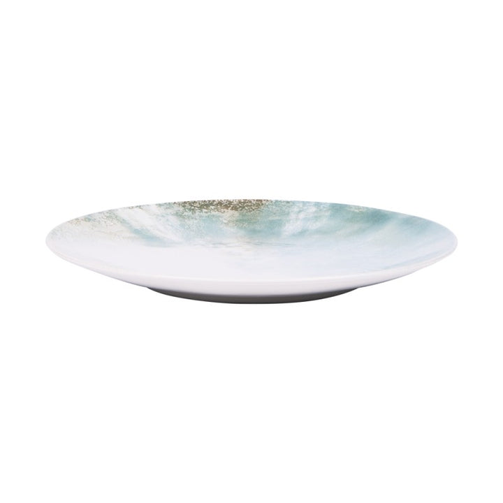 Top view of Islande ceramic plate with white and green coastal-inspired glaze.