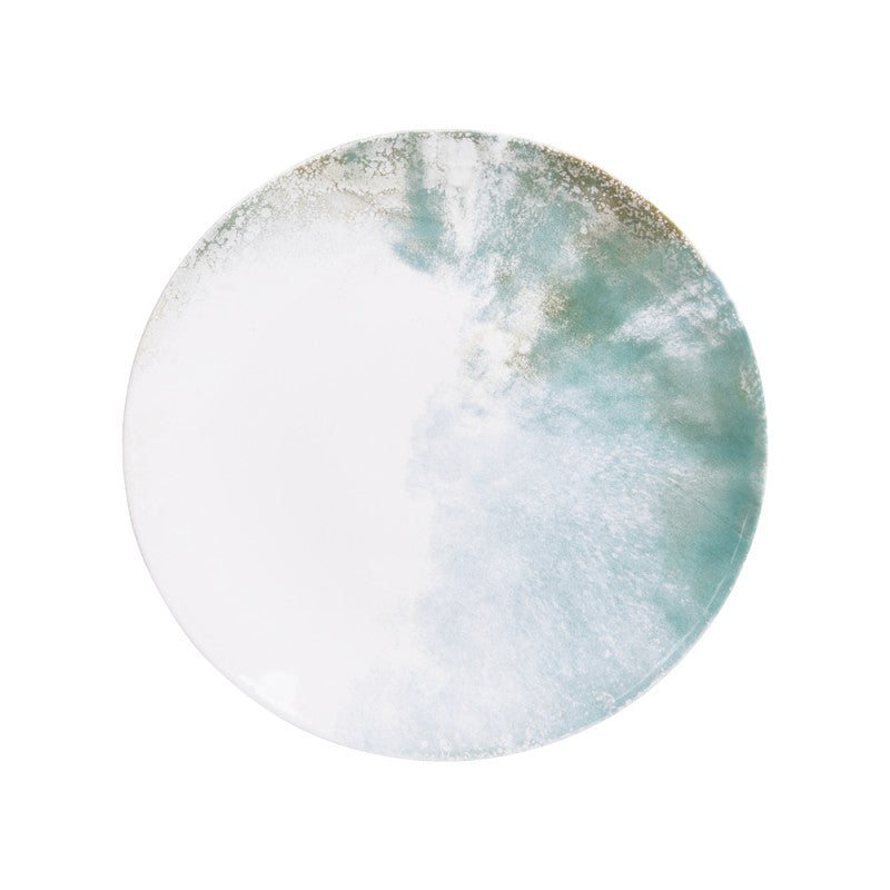 Top view of Islande ceramic bowl with white and green coastal-inspired glaze.