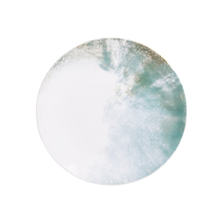 Top view of Islande ceramic dessert plate with white and green coastal-inspired 