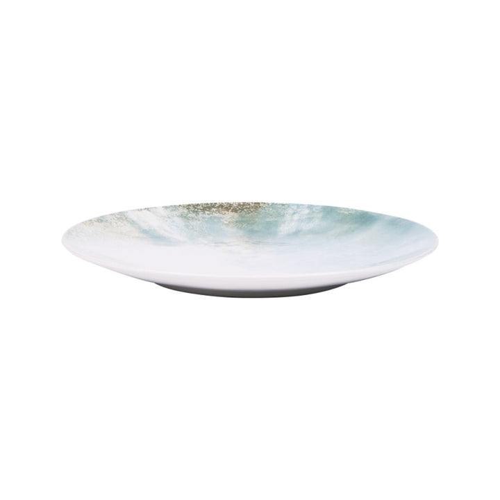 Top view of Islande ceramic dessert plate with white and green coastal-inspired 