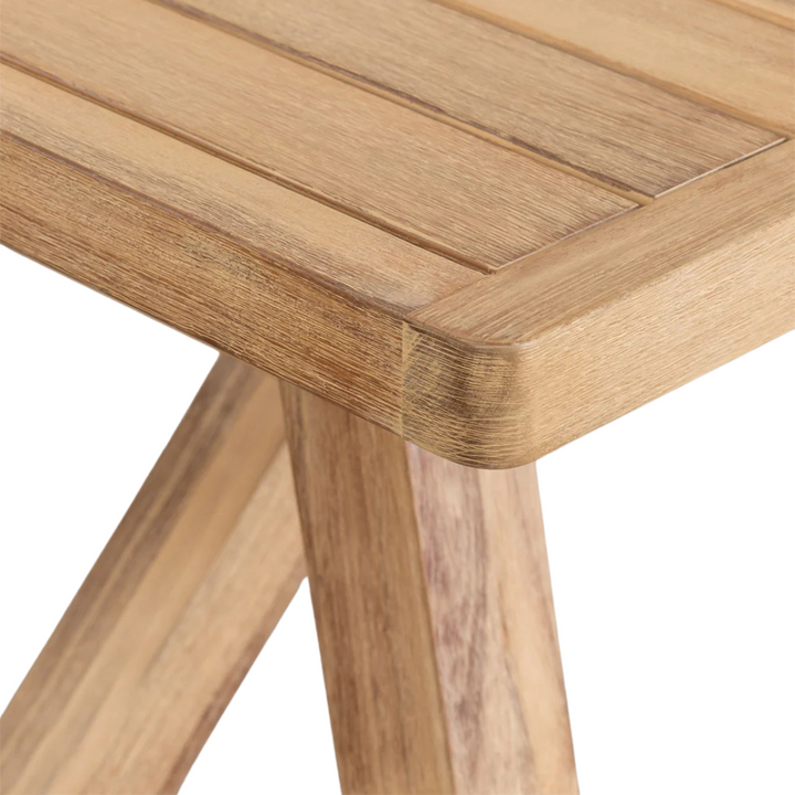 Detail of the corner joinery showcasing the natural acacia grain.