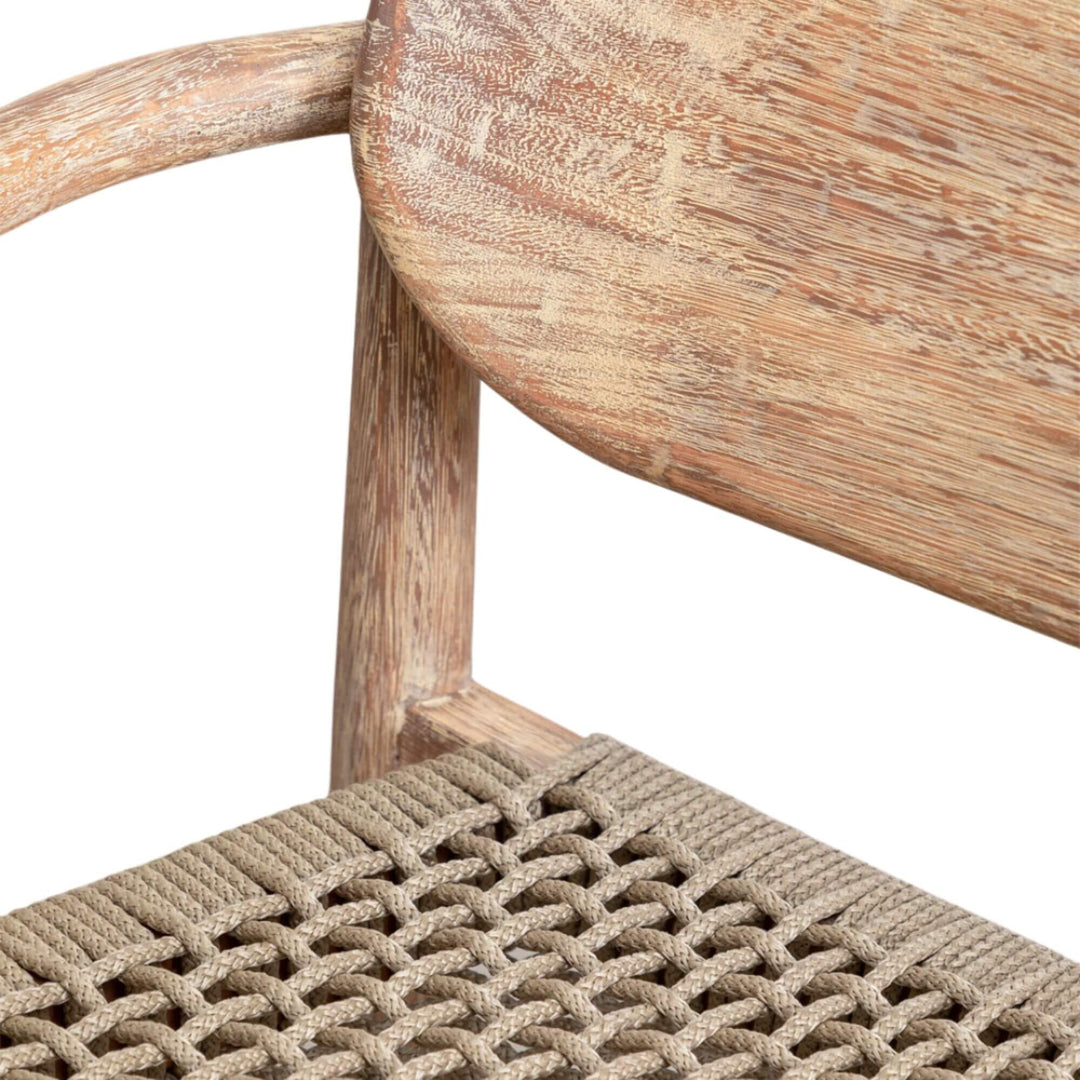 Close-up of the Jaipur Dining Chair backrest showing natural wood grain.