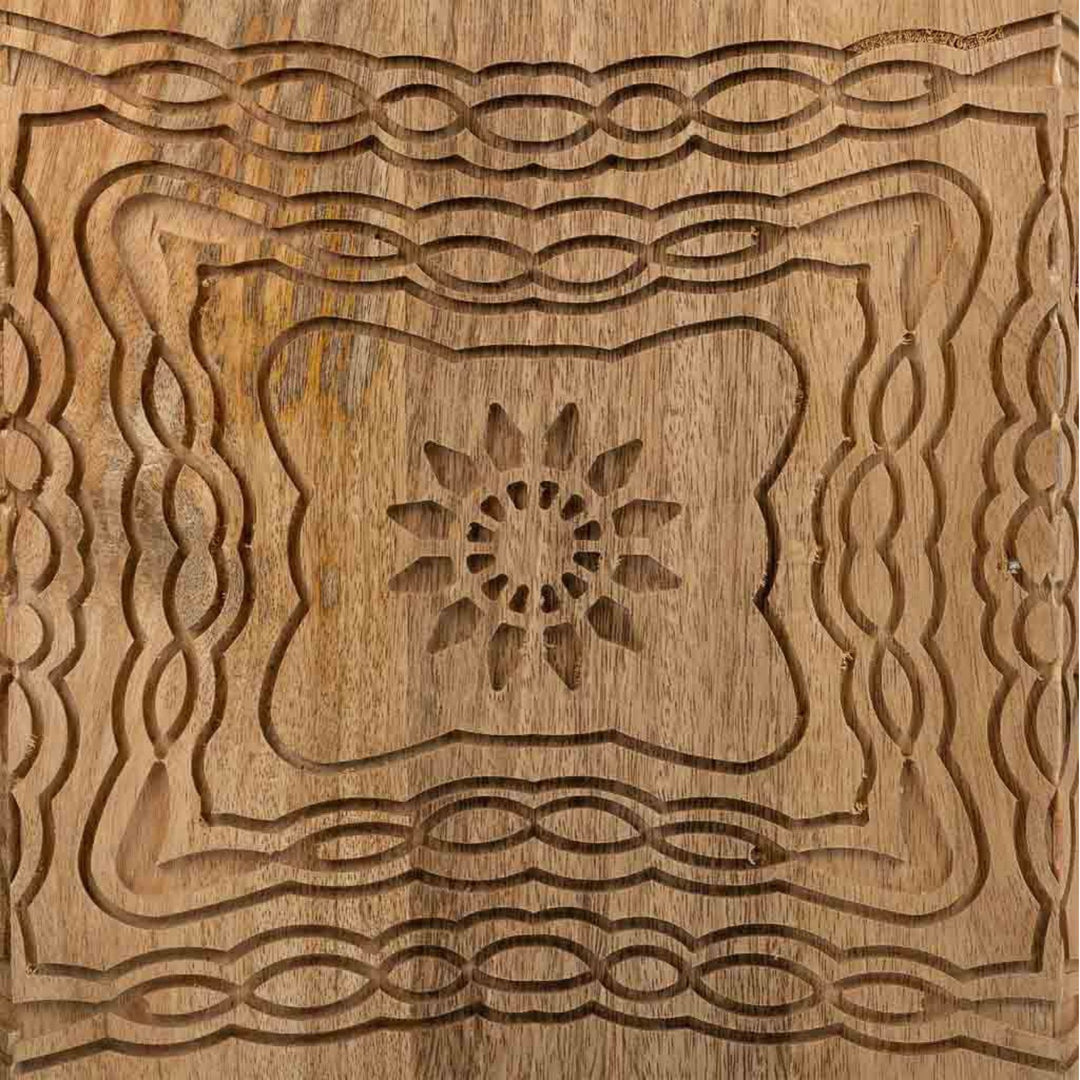 Close-up detail of the intricate hand-carved wood design on the Jali stool.