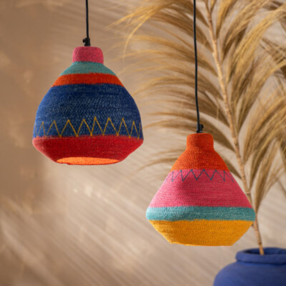 Jerba ceiling lamps illuminated in a styled interior.