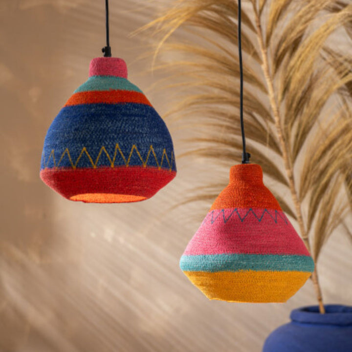 Jerba ceiling lamps illuminated in a styled interior.