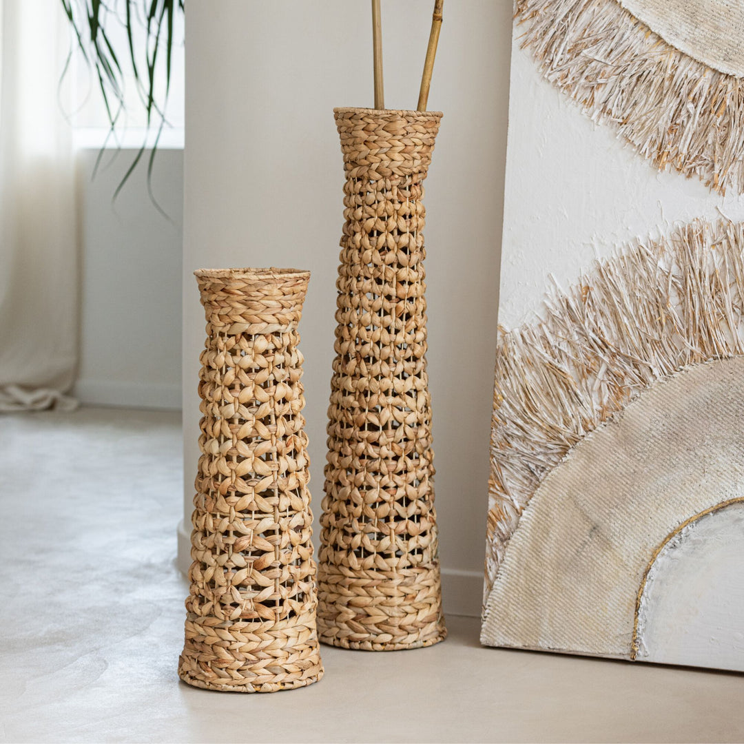 Jonas vase styled as a floor vase with dried branches in a neutral interior setting.