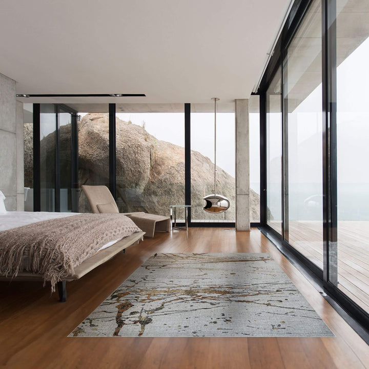 Modern bedroom interior featuring the Jura rug along a large window facade.