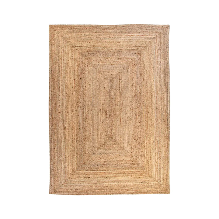 Front view of the rectangular natural jute rug featuring a structured framed woven pattern