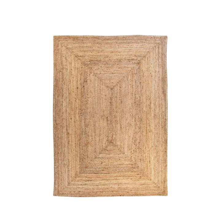 Full top view of the rectangular jute rug showing its layered framed design
