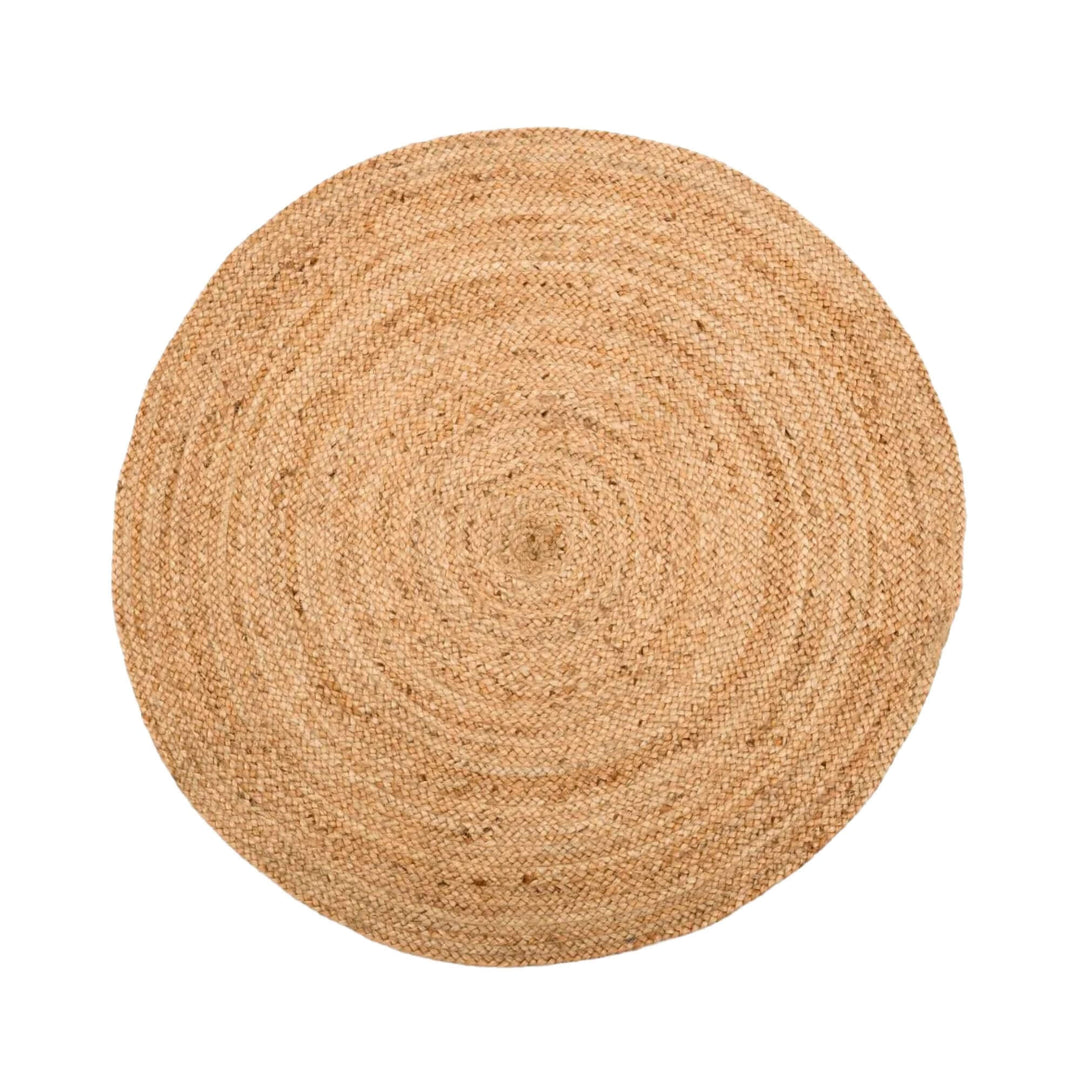 Front view of the round natural jute rug showing its circular shape and concentric woven pattern