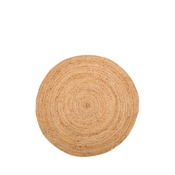 Medium-sized round jute rug with handwoven concentric design on a white background