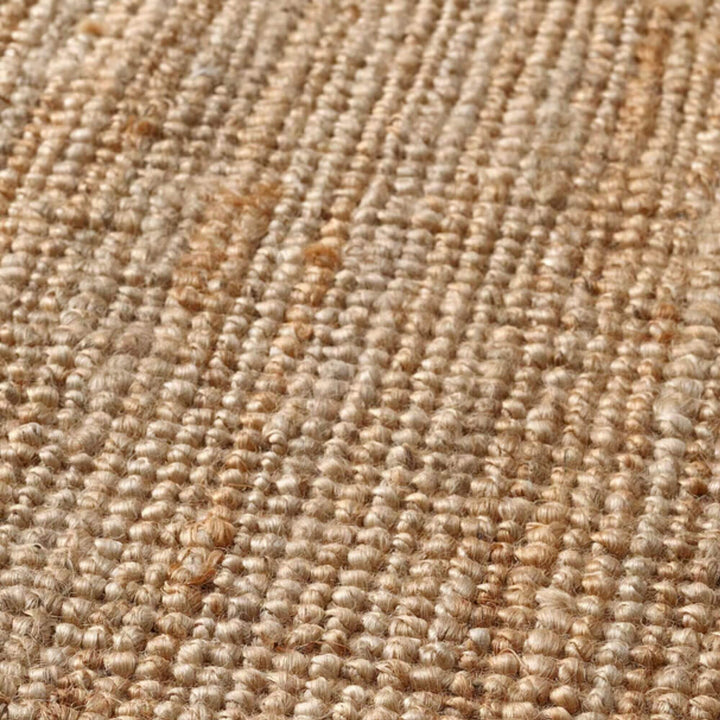 Detailed view of the natural jute weave showing its earthy tones and organic fiber texture