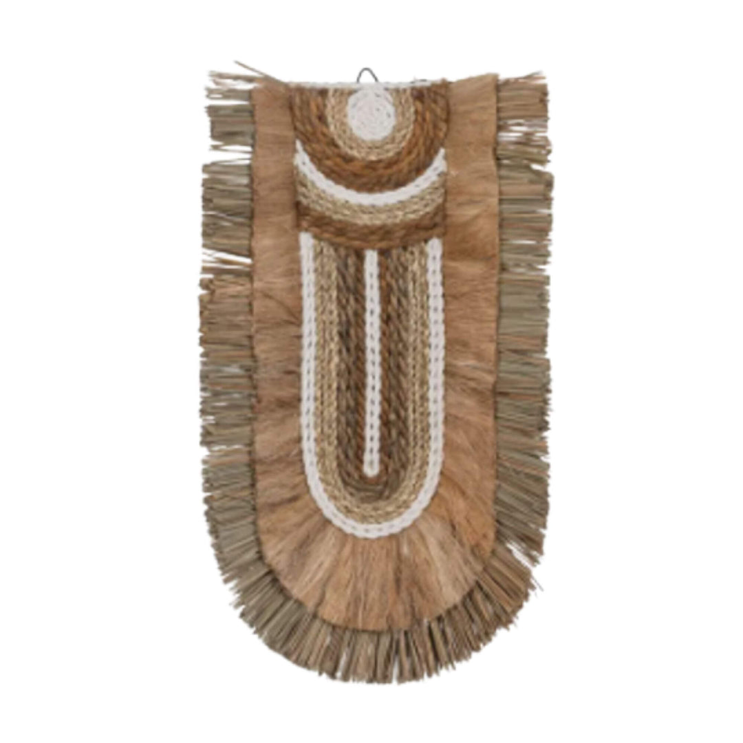 Boho-style Kalalao wall deco “E” in natural and white tones with detailed fringe texture.

