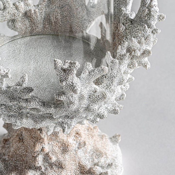 Close-up detail of the textured white resin base highlighting organic coral-inspired design.