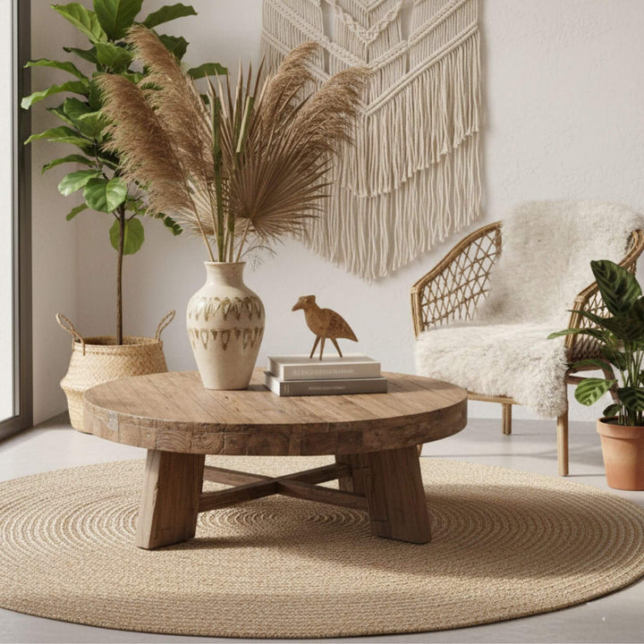 Cozy indoor lounge with the Kalon round recycled teak table.