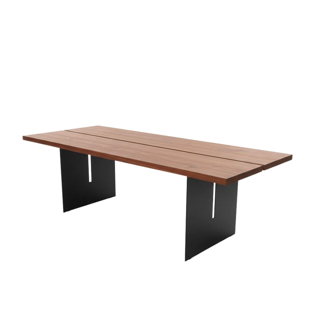Kambala Dining Table with natural wood top and black metal legs.