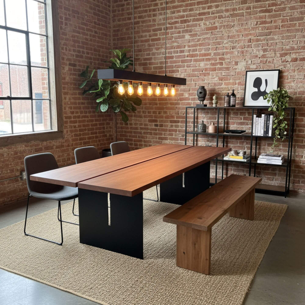 Dining room setup featuring the large Kambala table in a modern industrial space.