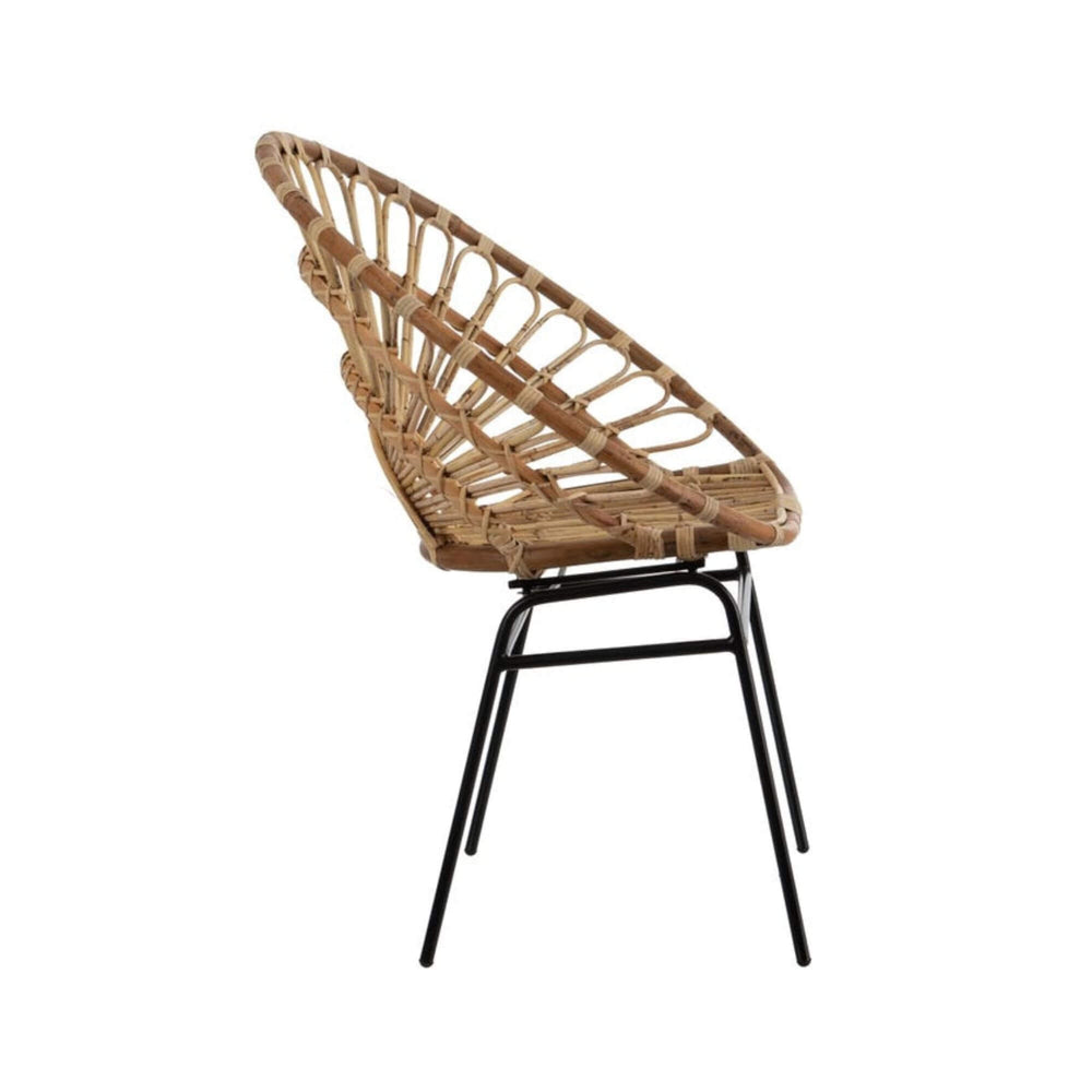 Side view of rattan lounge chair with radial woven design