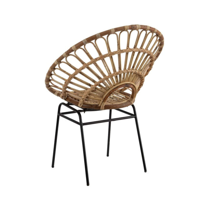 Back view of Kan Kan rattan accent chair with iron legs