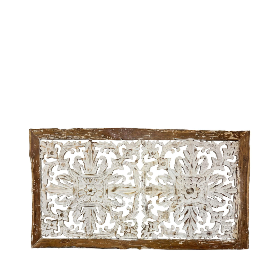 Front view of the Kapalai teak wood wall decor with intricate carved floral patterns.