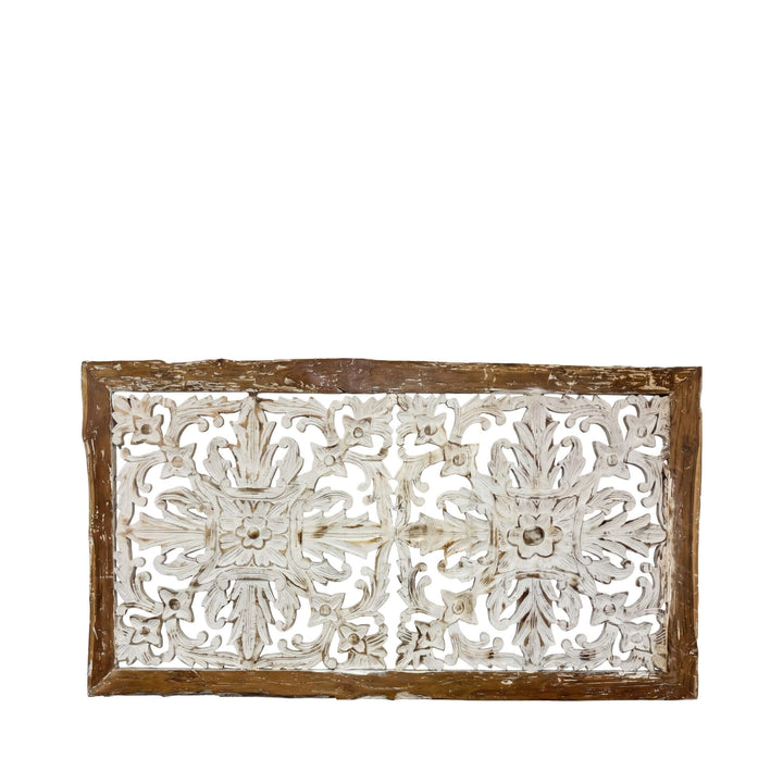 Front view of the Kapalai teak wood wall decor with intricate carved floral patterns.