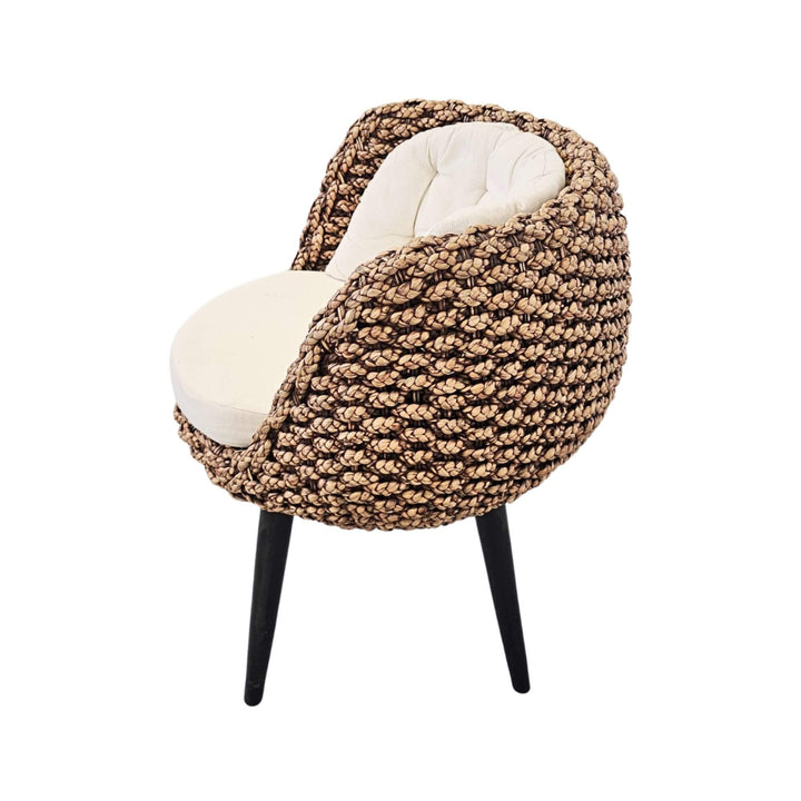 Side view of rattan chair with cushion
