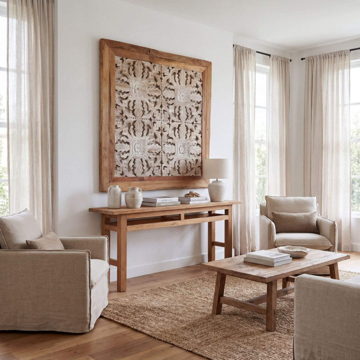 Living room with a large wooden Kavya wall panel featuring intricate carvings