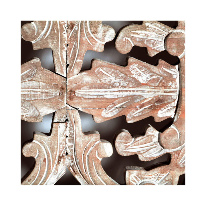 Close-up of wood carving details and painting.